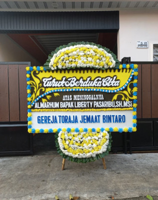 Papan Bunga Duka di Gumukmas